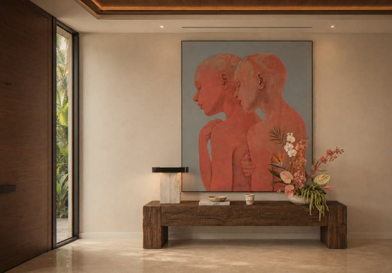 Entrance with a large figurative painting and a wooden console