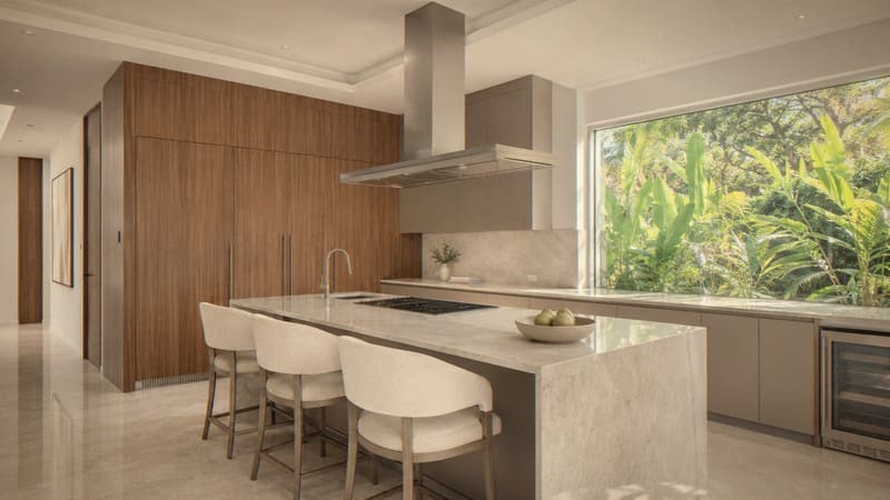 Kitchen with walnut tall units and a travertine island
